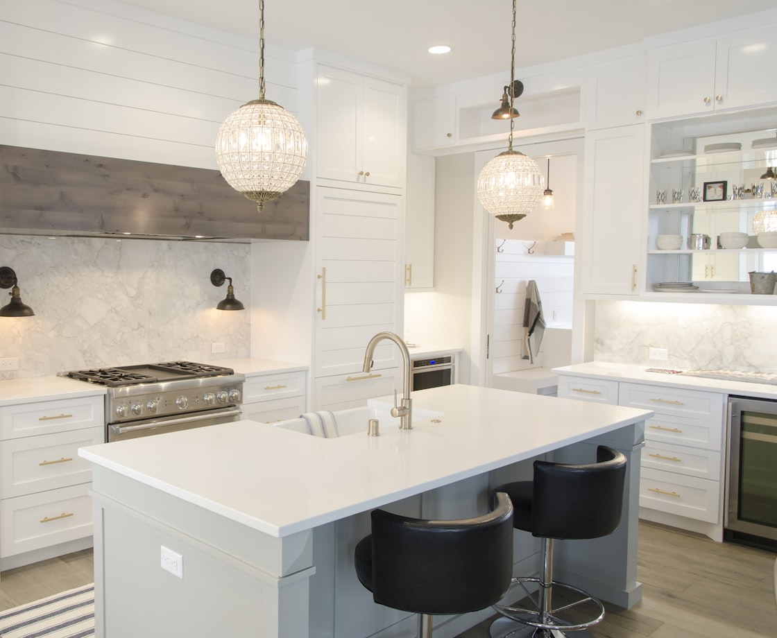 Modern white kitchen remodel by RS Remodeling, Waller TX